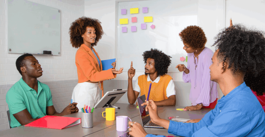 Team of Nigerian professionals planning HR strategy in a modern office